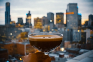 Espresso martini in front of cityscape